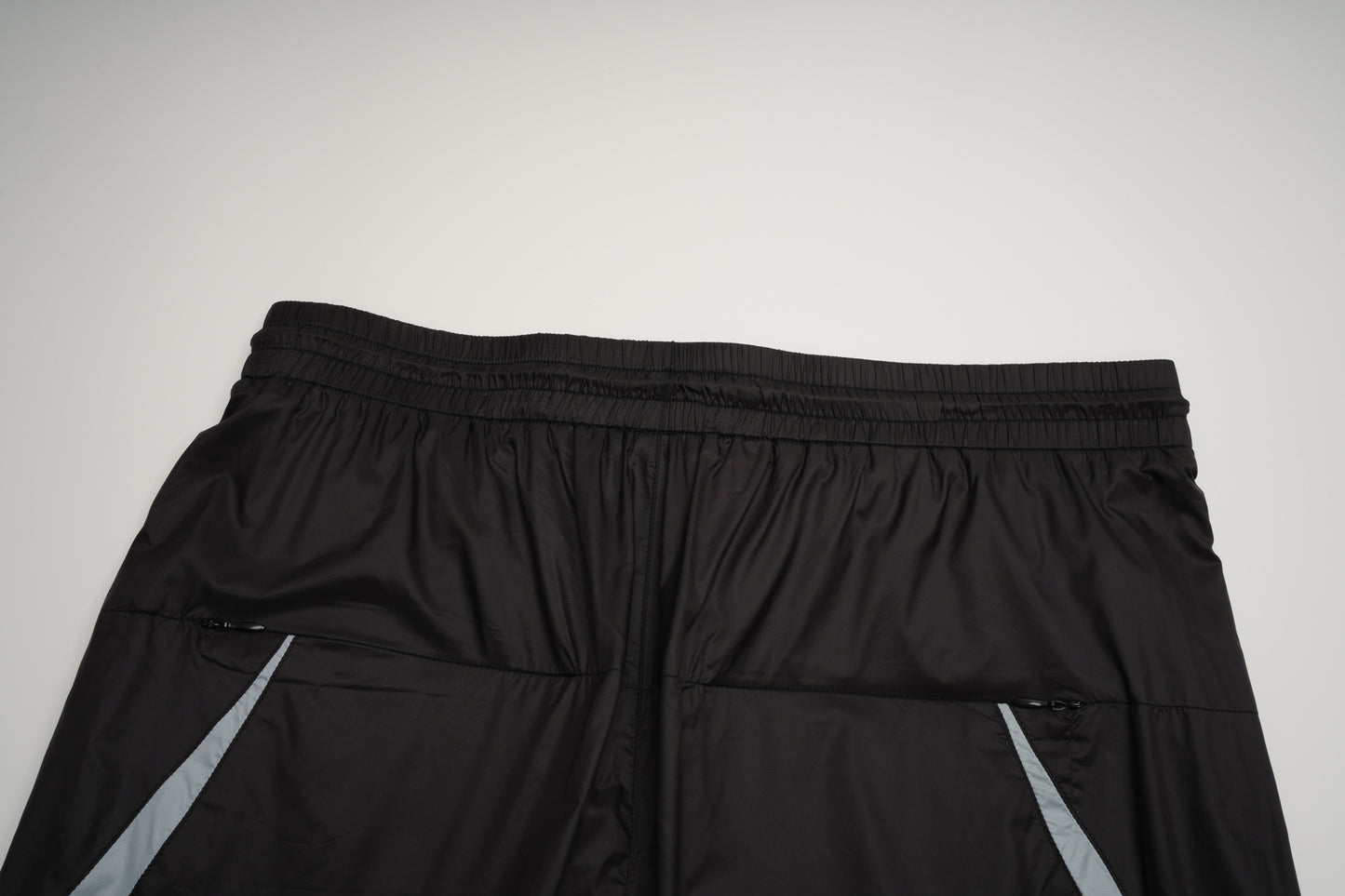 DETACHABLE TRACK PANTS